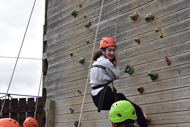 girl rockwall climbing at carlingford